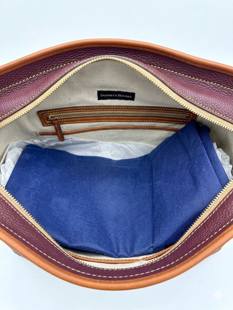 Dooney & Bourke Stylish brown tote bag perfect for everyday use or as a chic accessory. Women's Designer Handbags Bordeaux